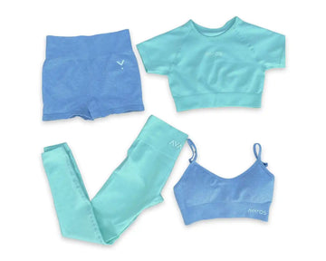 Workout set featuring mint green and blue athletic wear pieces including shorts, crop top, leggings, and sports bra.